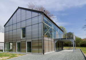 Maison-serre à Asse